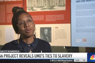 1856 Project co-chair Lae'l Hughes-Watkins speaks while a news caption reads "1856 PROJECT REVEALS UMD'S TIES TO SLAVERY"
